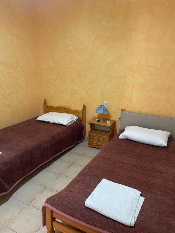 Postel nebo postele na pokoji v ubytování Tasos Manaritsas Rooms