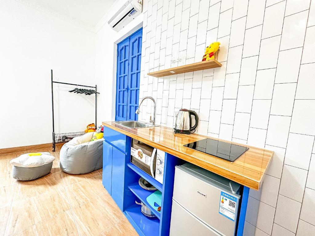 Kuchyň nebo kuchyňský kout v ubytování La Casa Di Dicembre - Nguyễn Như Đổ