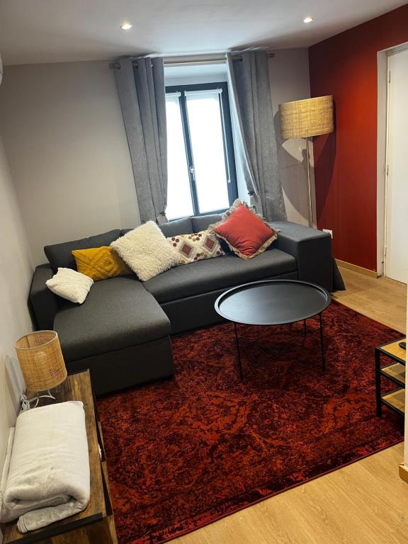 Χώρος καθιστικού στο Agréable Appartement Centre B