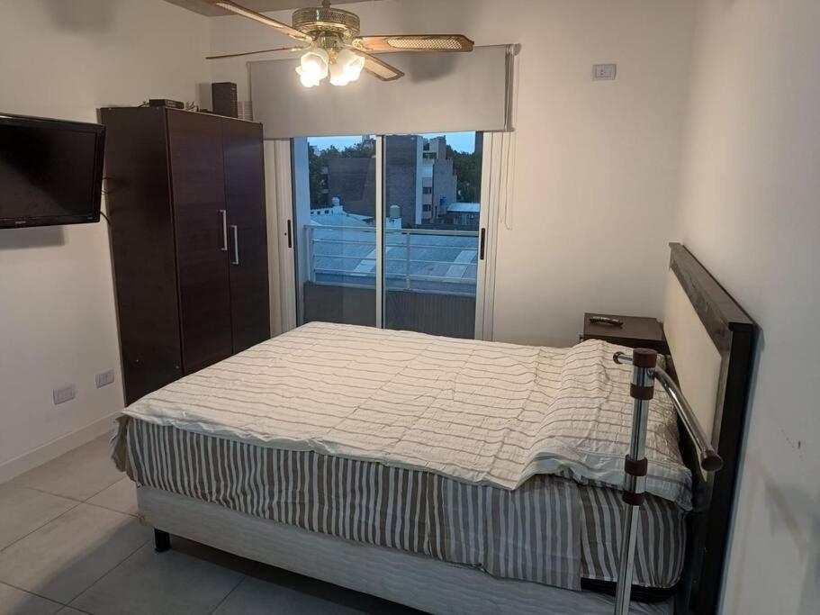 Postel nebo postele na pokoji v ubytování Monoambiente en Rosario