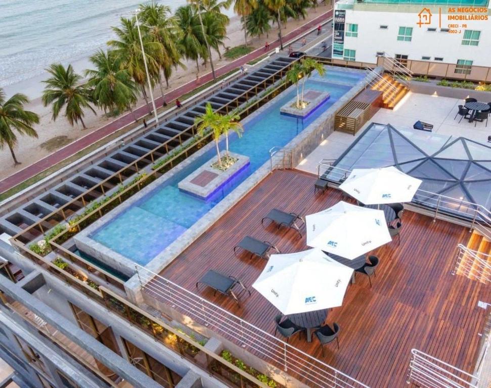 Der Swimmingpool an oder in der Nähe von Unity - Cabo Branco
