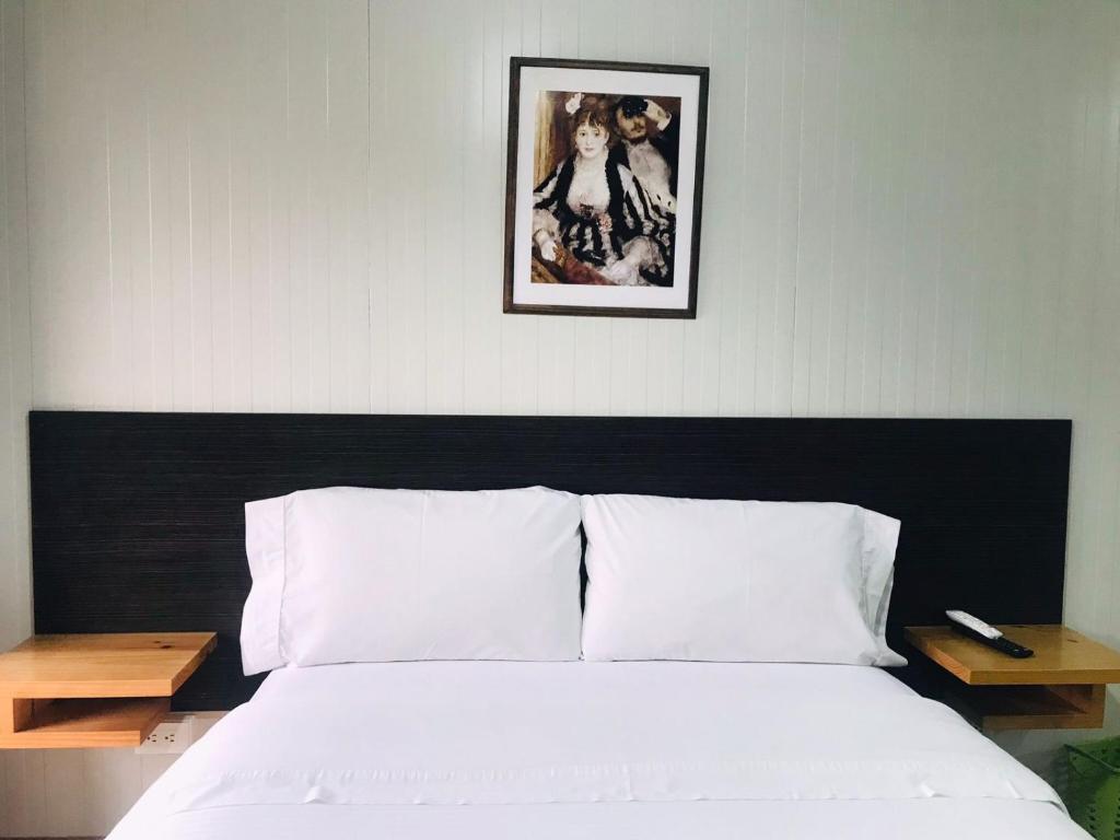 Postel nebo postele na pokoji v ubytování Hotel & Golf Isak Aeropuerto