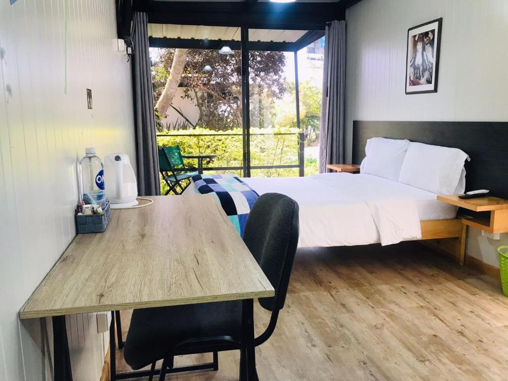 Postel nebo postele na pokoji v ubytování Hotel & Golf Isak Aeropuerto