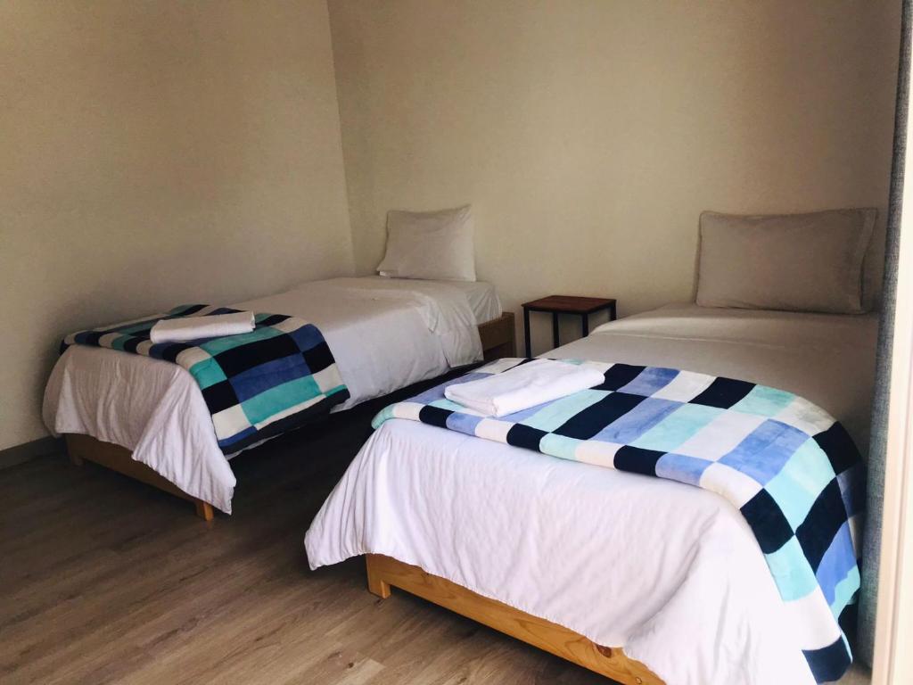 Postel nebo postele na pokoji v ubytování Hotel & Golf Isak Aeropuerto