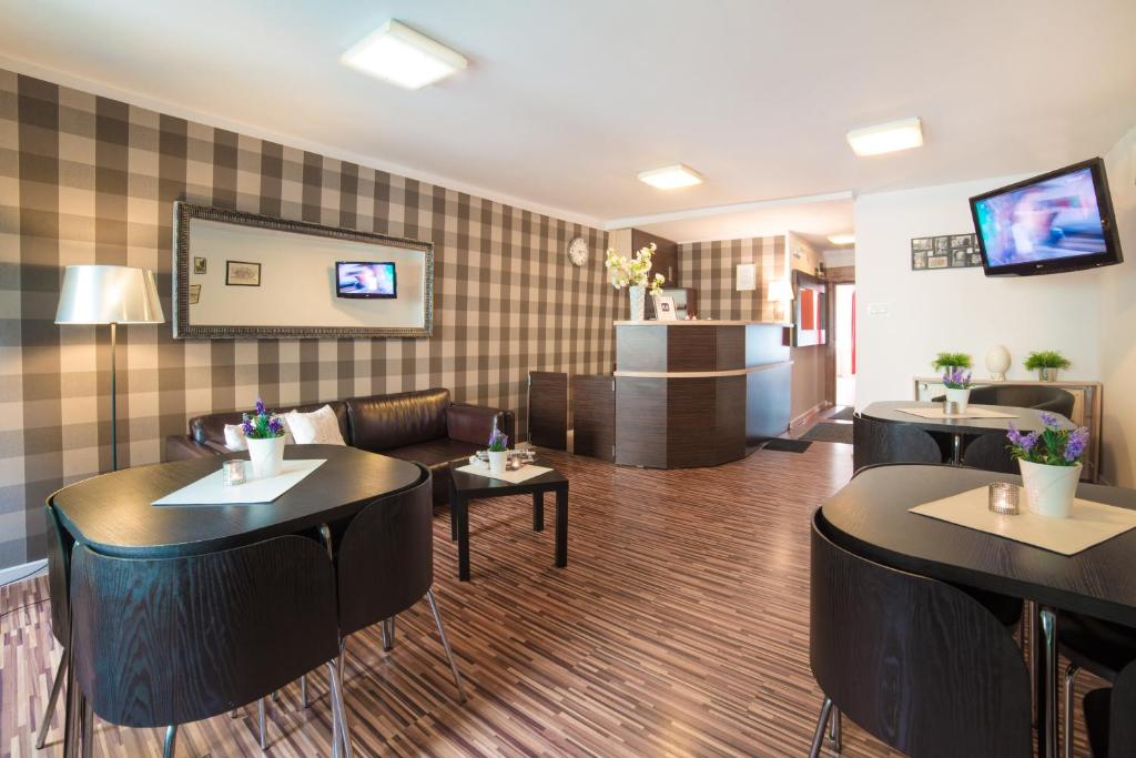 TV a/nebo společenská místnost v ubytování Green Hostel