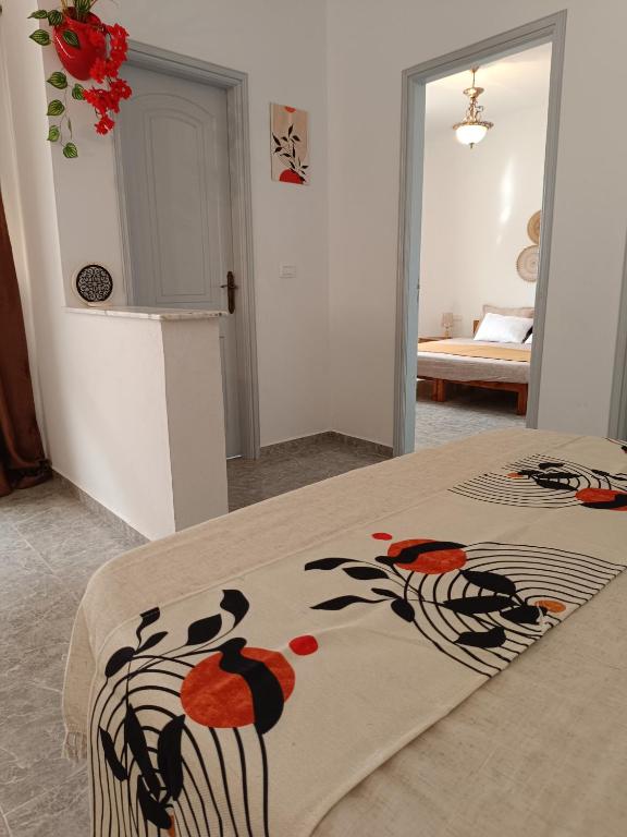 Postel nebo postele na pokoji v ubytování Sawsen Ghar el melh