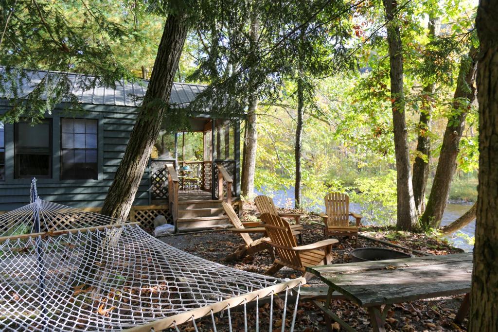 a hammock in the yard of a house at neversink river resort 