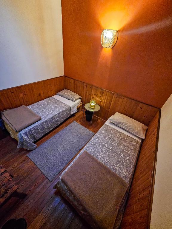 Postel nebo postele na pokoji v ubytování Rifugio Guglielmo e Giovanni Pelizzo
