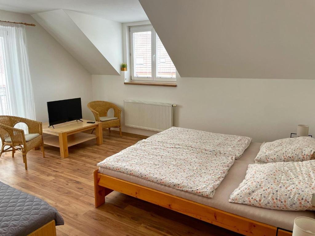 Postel nebo postele na pokoji v ubytování Apartmán Tereza