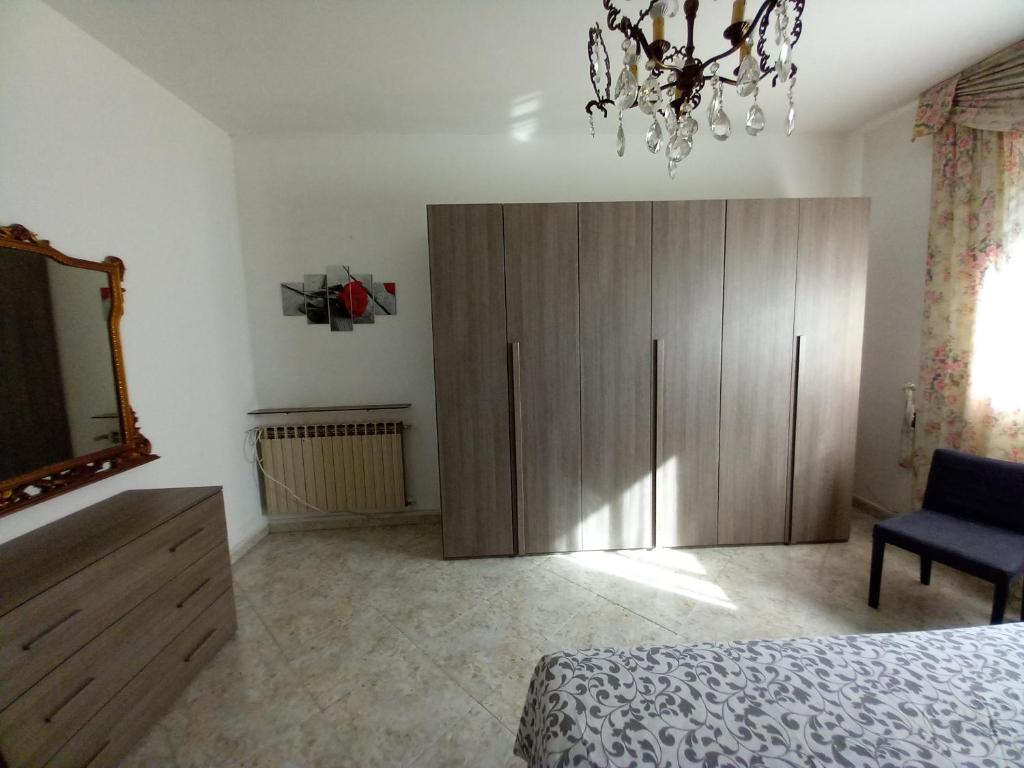 Postel nebo postele na pokoji v ubytování la casa di sotto