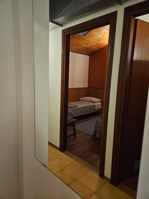 Postel nebo postele na pokoji v ubytování Rifugio Guglielmo e Giovanni Pelizzo