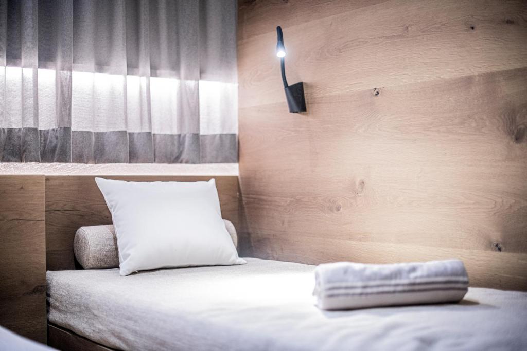 Postel nebo postele na pokoji v ubytování Hotel Wieser