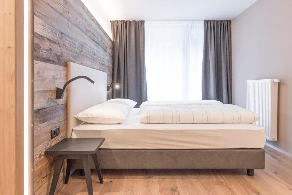 Postel nebo postele na pokoji v ubytování Hotel Wieser