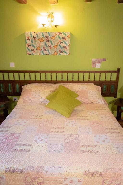 Posteľ alebo postele v izbe v ubytovaní Hostal-Resturante La Moruga