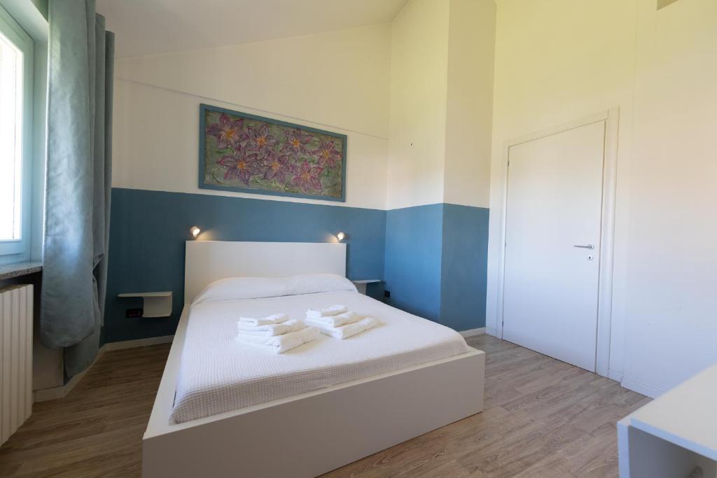 Postel nebo postele na pokoji v ubytování Casa Vecchia Quercia