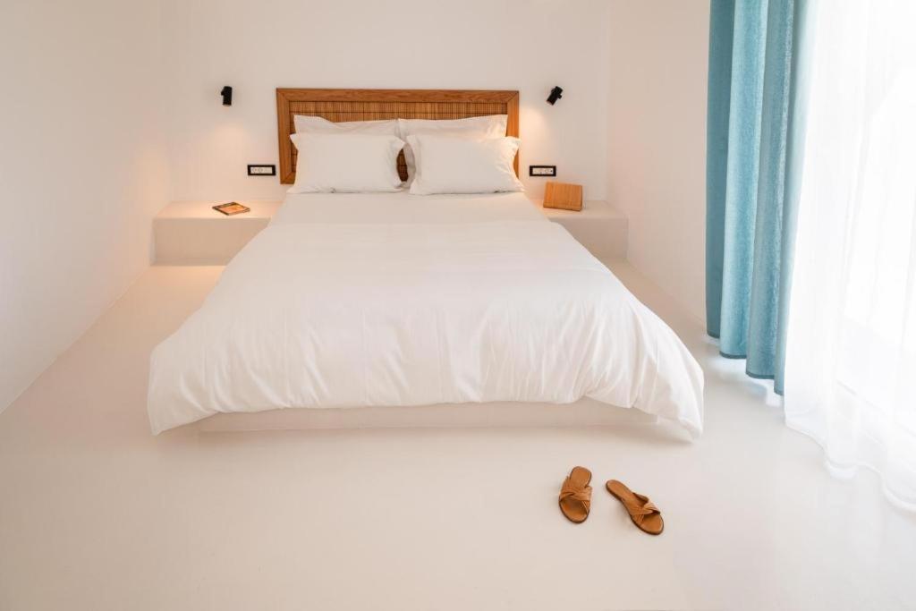 Letto o letti in una camera di Piccole Case