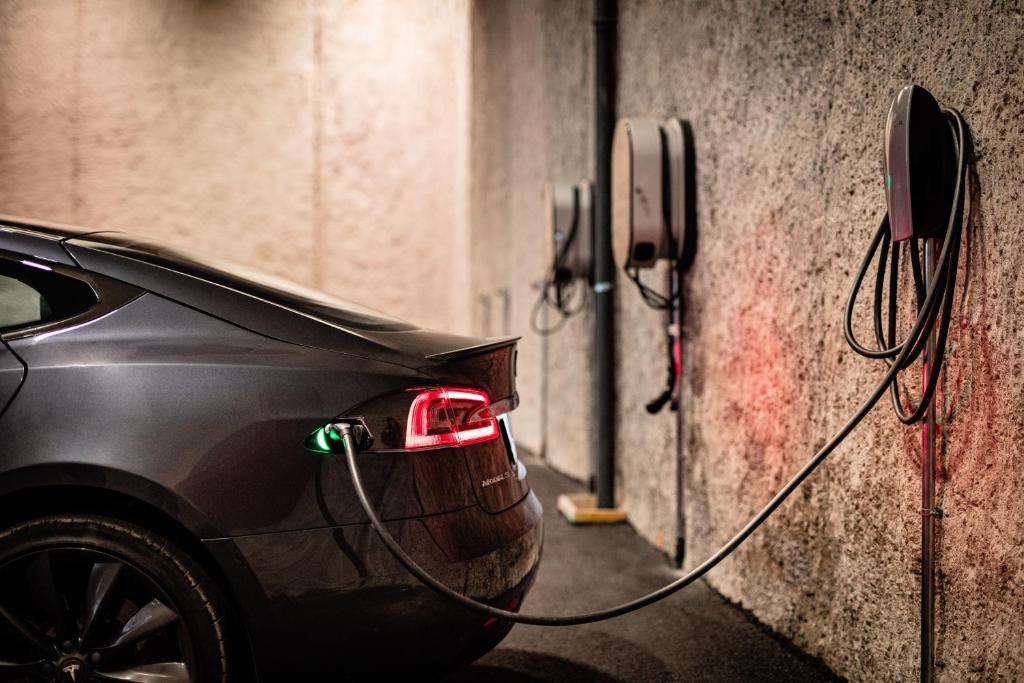 a car is hooked up to a wall at Hotel Alpenroyal - The Leading Hotels of the World in Selva di Val Gardena