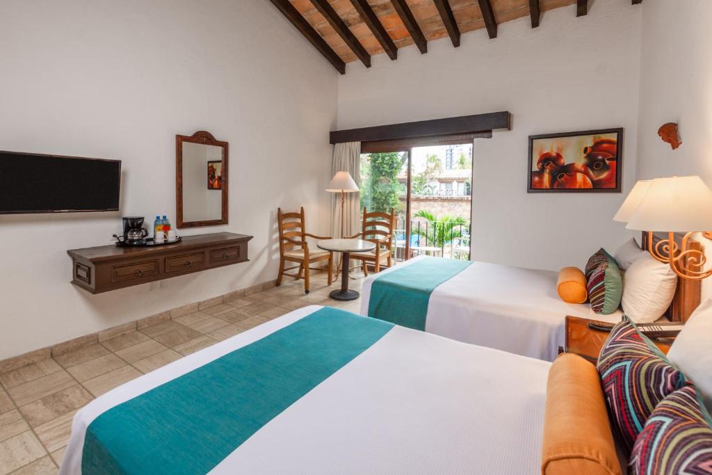 Postel nebo postele na pokoji v ubytování Hacienda Buenaventura Hotel & Mexican Charm - All Inclusive