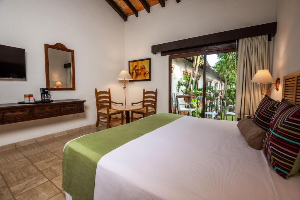 Postel nebo postele na pokoji v ubytování Hacienda Buenaventura Hotel & Mexican Charm - All Inclusive