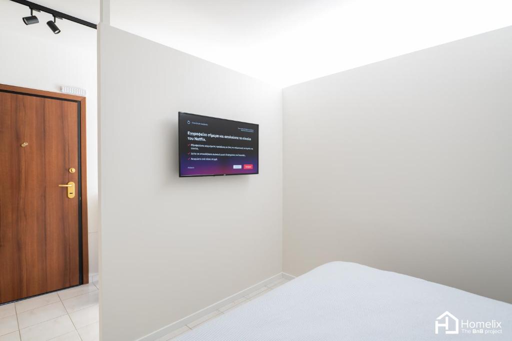 TV a/nebo společenská místnost v ubytování Agora Central Home