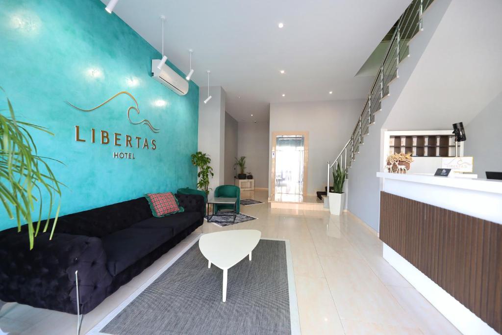 Kuchyň nebo kuchyňský kout v ubytování HOTEL LIBERTAS