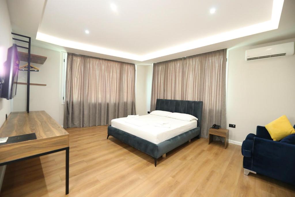 TV a/nebo společenská místnost v ubytování HOTEL LIBERTAS