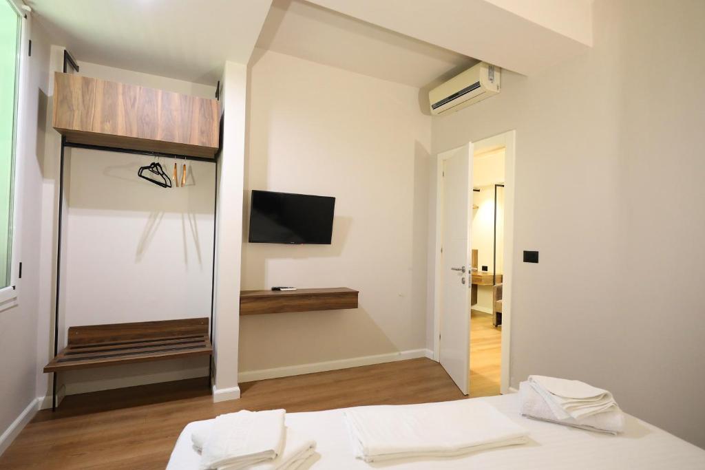 Postel nebo postele na pokoji v ubytování HOTEL LIBERTAS