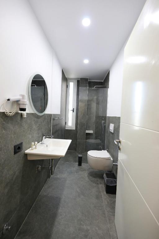 Koupelna v ubytování HOTEL LIBERTAS