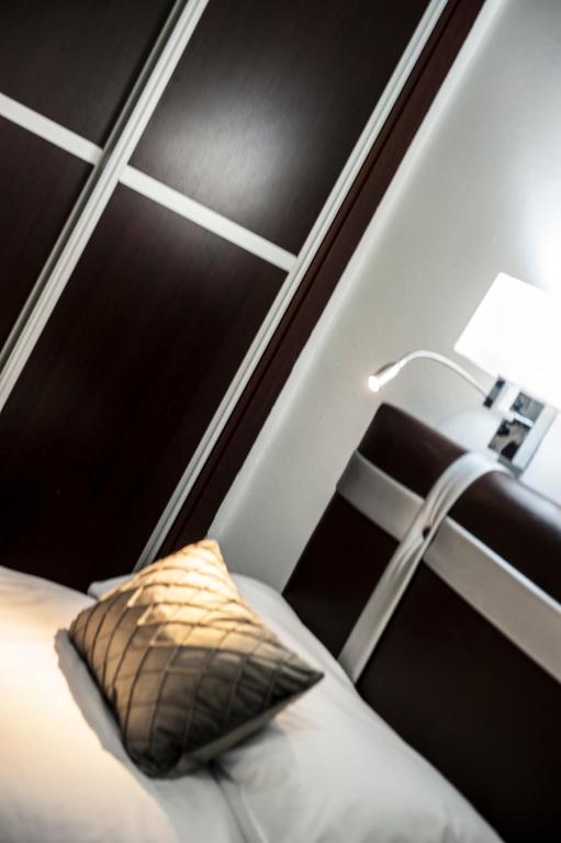 Postel nebo postele na pokoji v ubytování HOSTAL LAS PALOMAS