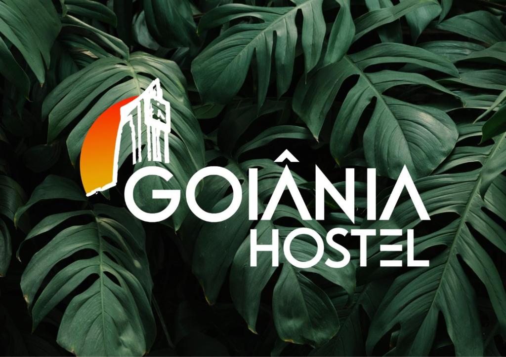 a logo for a colombia hospital at Goiânia Hostel. in Lucas do Rio Verde