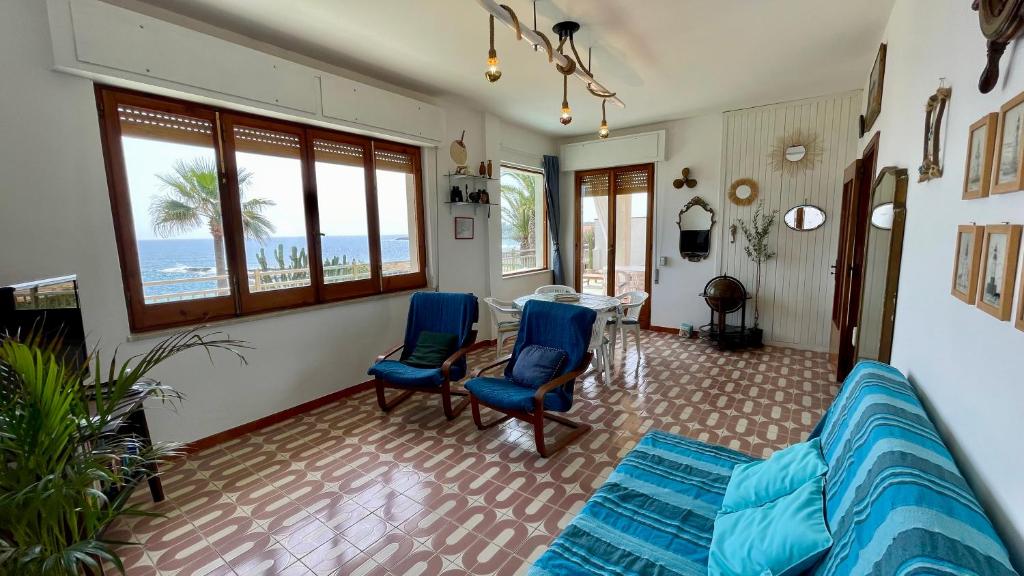 Гостиная зона в Cuore di Ognina - Appartamenti vista mare