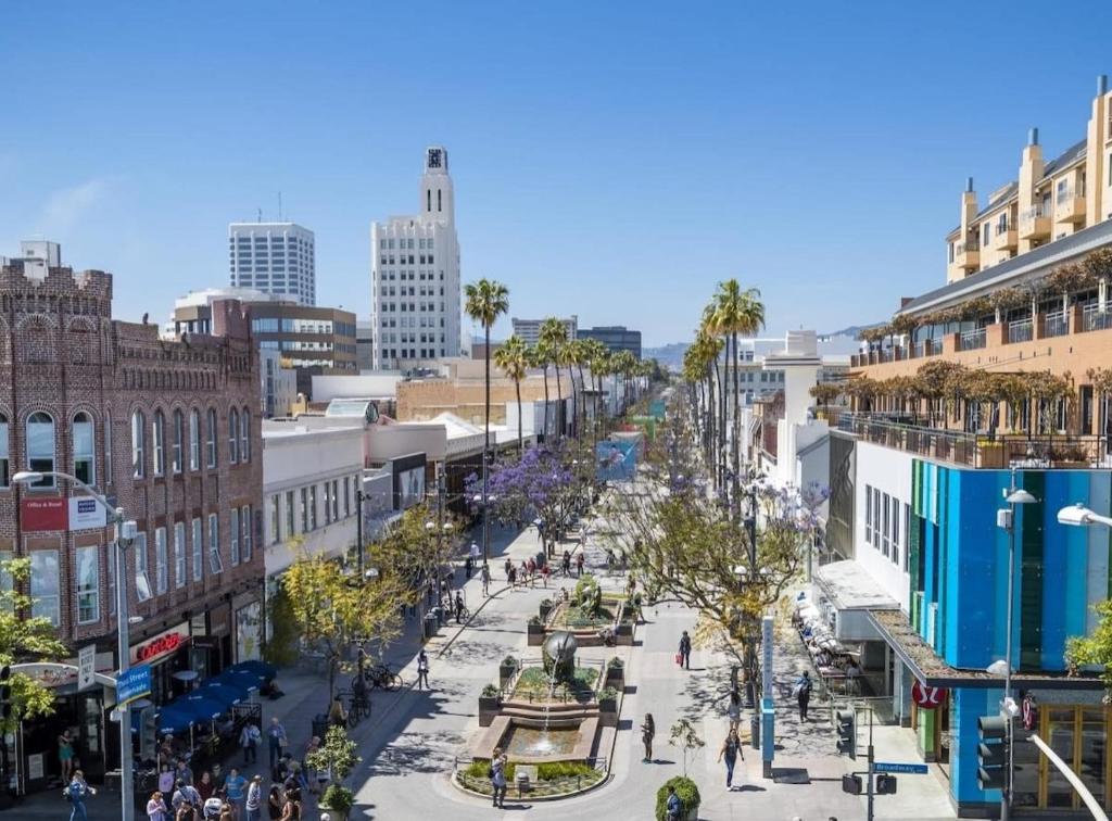 a view of a city street with buildings at 3 Lux large apartment heart of SM in Los Angeles