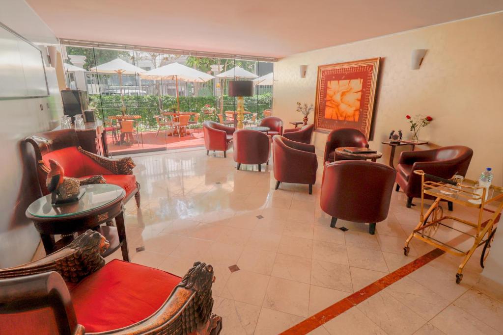Χώρος καθιστικού στο Hotel Boutique Runcu Miraflores