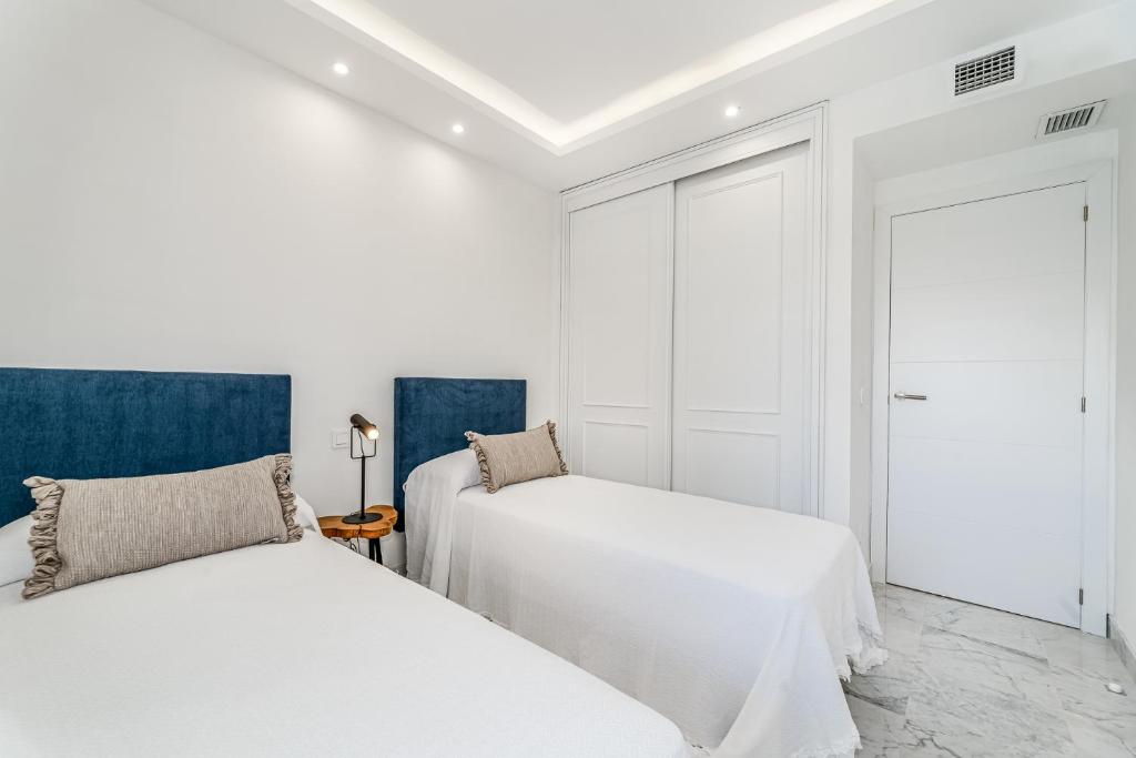Postel nebo postele na pokoji v ubytování New and Modern Apartment in the heart of Puerto Banús