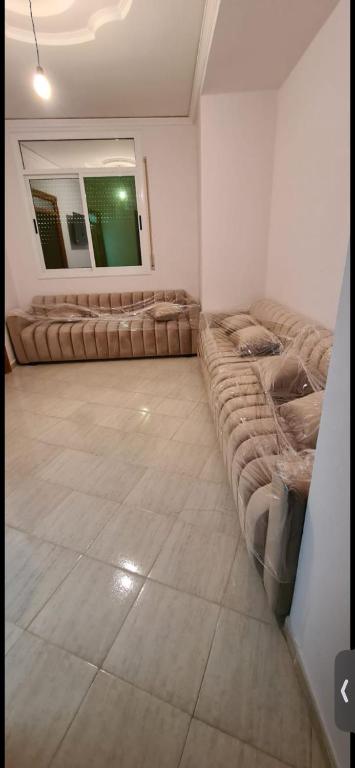 Area tempat duduk di Appartement Bni Bouayach