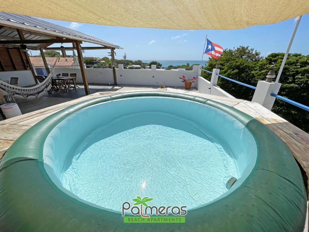 Bazén v ubytování Palmeras Beach Apartments - Playa Santa nebo v jeho okolí