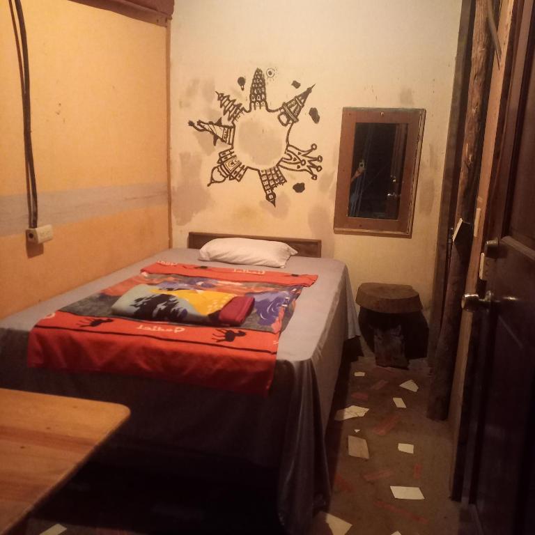 Postel nebo postele na pokoji v ubytování coraizone hostel