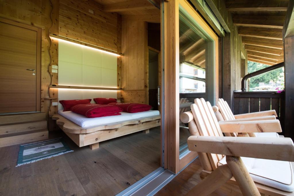 Postel nebo postele na pokoji v ubytování La Ücia by Fana Ladina