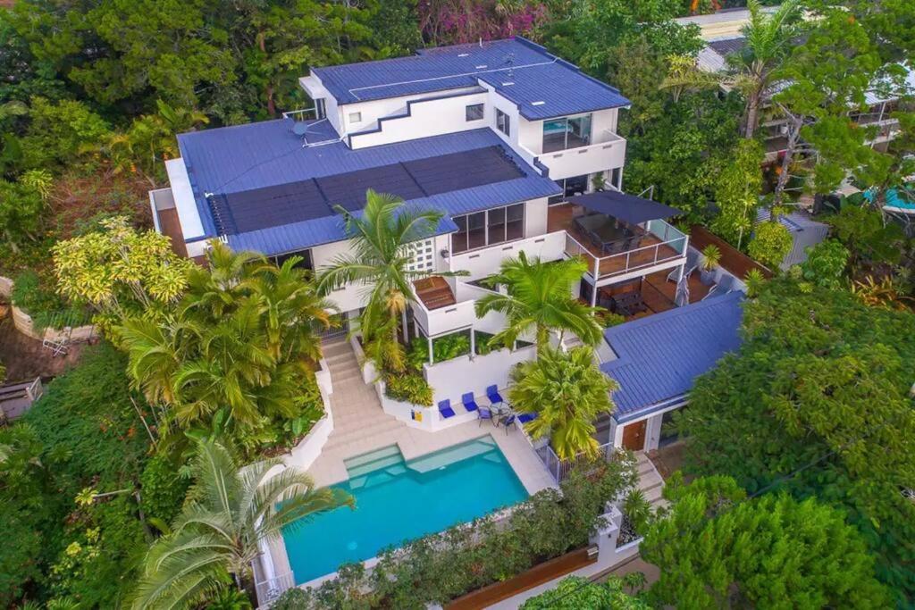 an aerial view of a house with a swimming pool at Peregian Beach Holiday House & Resort Pet Friendly in Peregian Beach