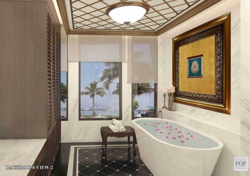 Postel nebo postele na pokoji v ubytování Taj Malabar Resort & Spa, Cochin.