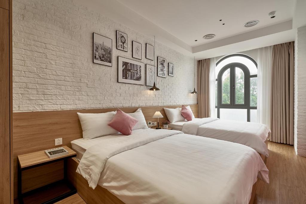 Postel nebo postele na pokoji v ubytování Hotel Ocean Homes