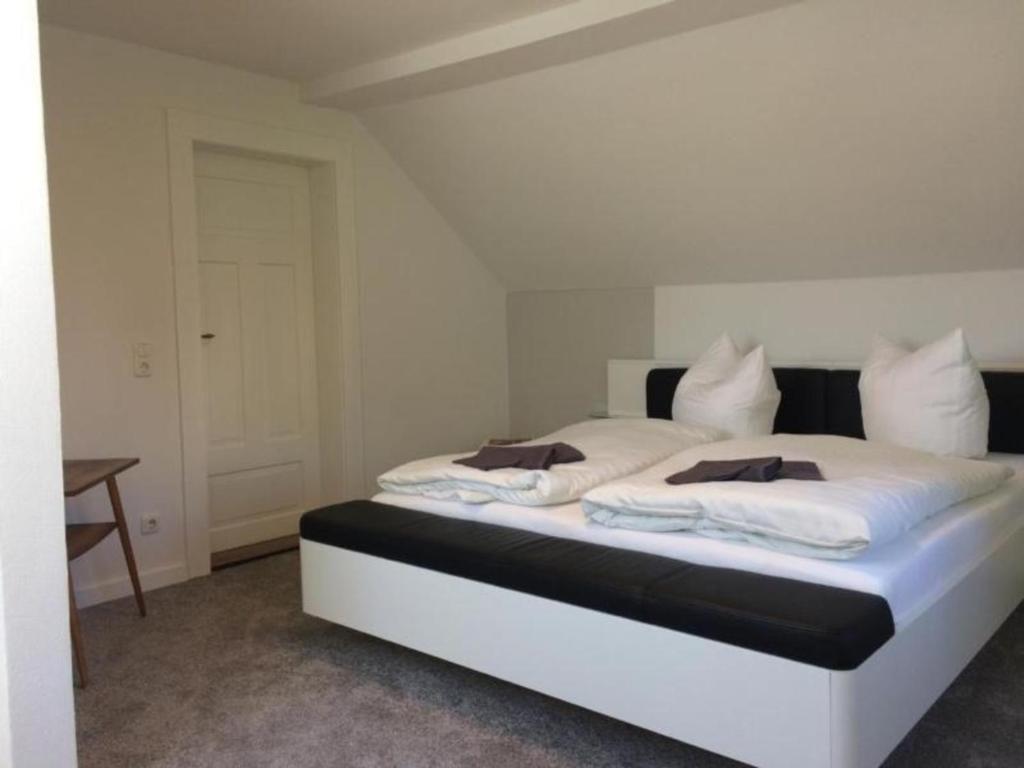Postel nebo postele na pokoji v ubytování Ferienhaus in Bad Elster mit Kleinem Kamin