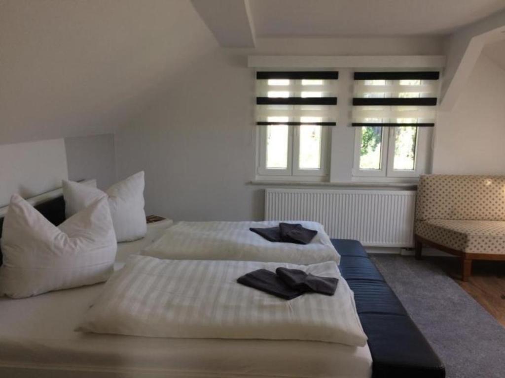 Postel nebo postele na pokoji v ubytování Ferienhaus in Bad Elster mit Kleinem Kamin