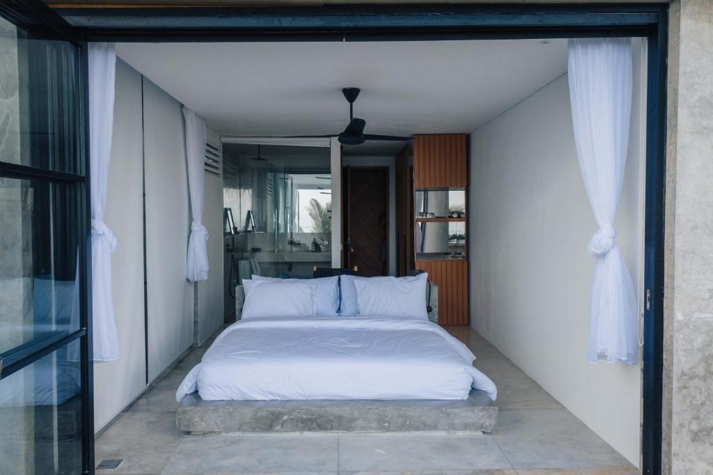 Postel nebo postele na pokoji v ubytování Mahi Mahi Beach Shack And Suites