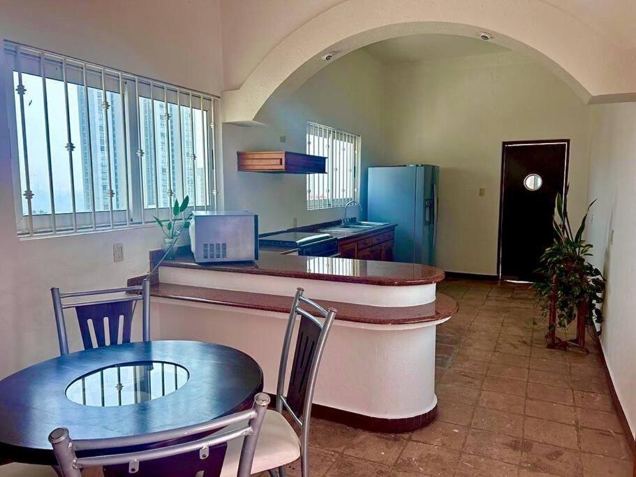 Posezení v ubytování Moderna casa de 3 dormitorios con cama King size y vistas al horizonte de la piscina