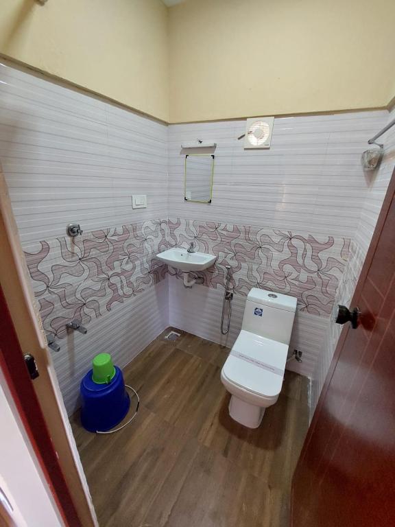 Koupelna v ubytování Karthika Homes