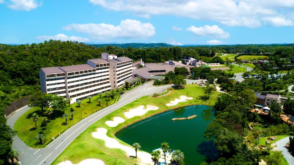 an aerial view of a hotel and a lake at Nesta Resort Kobe in Miki