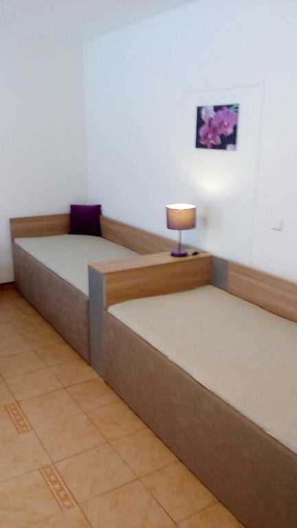Postel nebo postele na pokoji v ubytování Apartmány Fialka