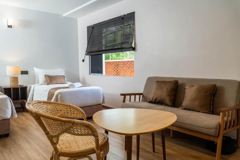 Letto o letti in una camera di Mulyo Hotel