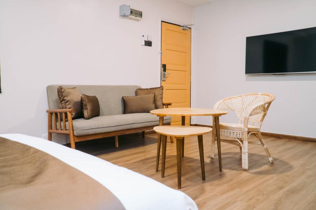 TV o dispositivi per l'intrattenimento presso Mulyo Hotel